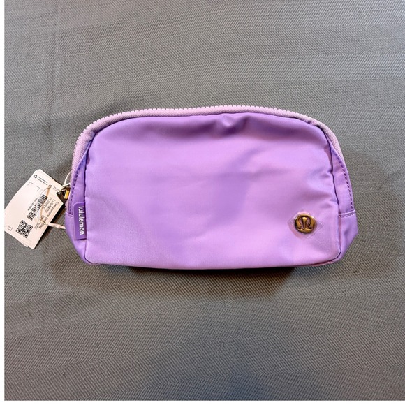 lululemon athletica Handbags - Lululemon Everywhere Belt Bag 1L Purple Gold Logo LU9AX2S Crossbody Fanny Pack